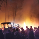 Volunteers prepare to douse a forest fire in the republic of Sakha also known as Yakutia, Russia Far East, Saturday, July 17, 2021.